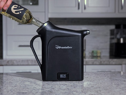 A happy wine enthusiast pouring a bottle into the ProntoBev.